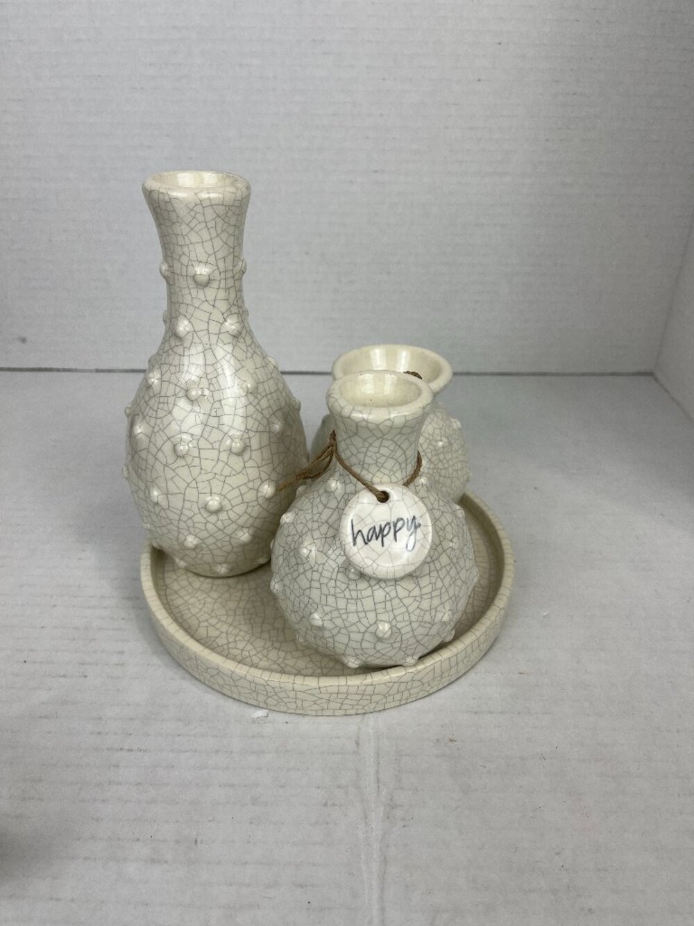 Trio of white ceramic Mudpie Vases permanenetly attached to plate, 7" x 7"